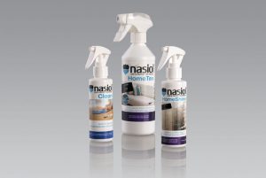 Grupo de tres productos en spray para la línea de hogar marca Nasiol: Clean, HomeTex y HomeShine